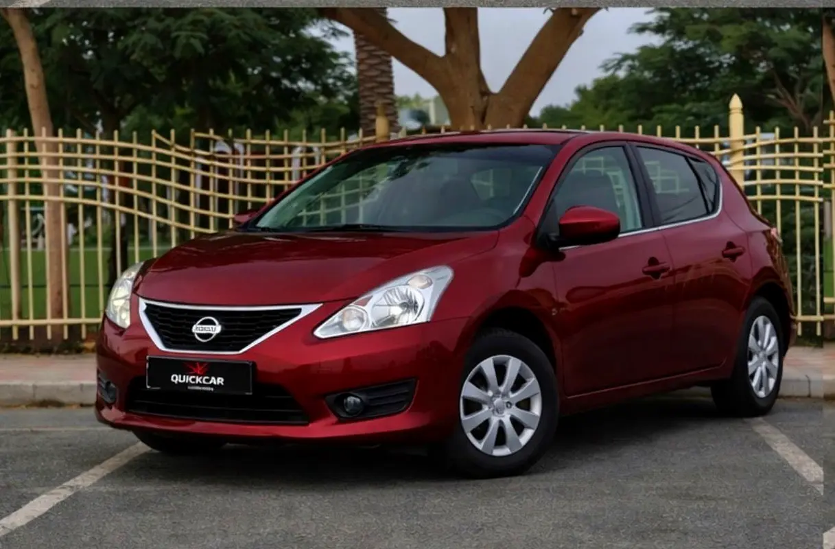 Nissan Tiida 2014 — photo 1 of 11