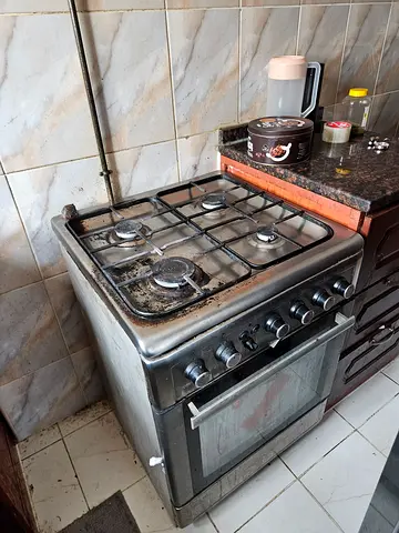 Used freestanding gas cooker with oven - stainless steel, needs cleaning