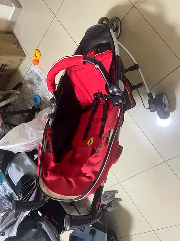 Ferrari red lightweight baby stroller/pram - good condition