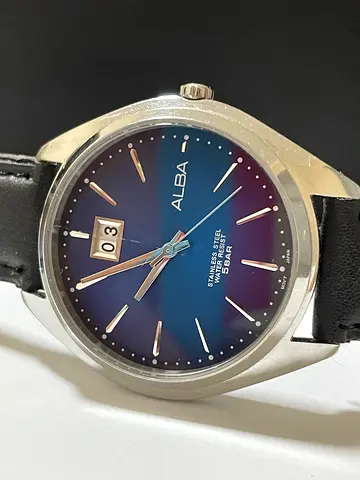 Alba mens stainless steel wristwatch with black leather strap, working