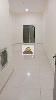 1 Bedroom Apartment for Annual Rent in Al Rawda 3 Ajman with Balcony and Closed Kitchen