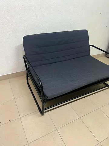 IKEA HAMMARN sofa bed in dark gray.