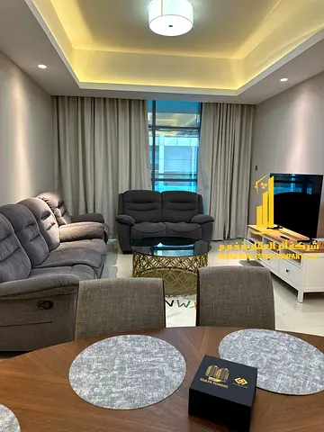 Luxury two-bedroom apartment with a living room, balcony, gym, and swimming pool. Ajman, Gulf Tower. Fully furnished.