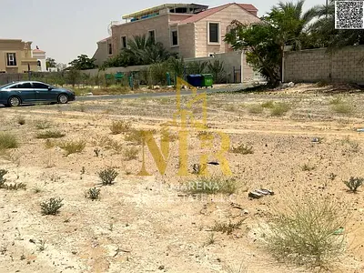 Prime residential land for sale in Al Hawshi, Sharjah, near the mosque and service road. 10,000 sq ft plot for AED 1,600,000 with ready building plans
