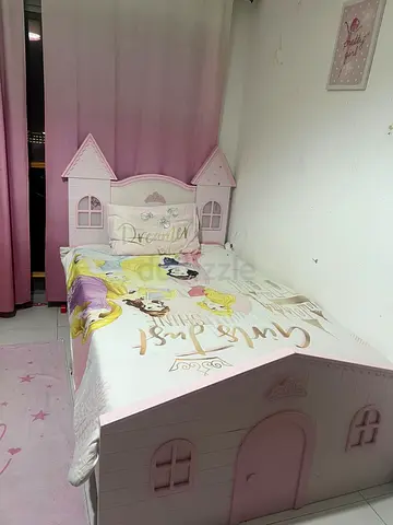 Childrens princess single bed with castle headboard
