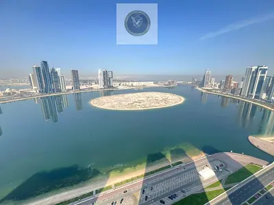 اجمل واكبر غرفتين وصاله بالخان\تشطيب فندقي\باركين مجاني\جيم\مسبح\تكيف مركزي\موقع مميز علي مخرج دبي\قريب من كل الخدمات