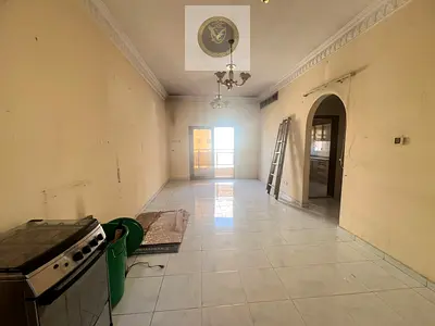 Spacious 2BR apartment in Al Qasimia Al Mahatta with 2 balconies, open city view, built-in wardrobes, direct access to Dubai