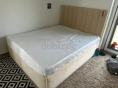 Beige Upholstered Queen Bed with Headboard (Excellent Condition)