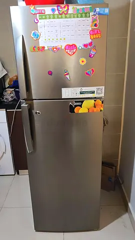 Used Silver Double-Door Refrigerator - Good Working Condition