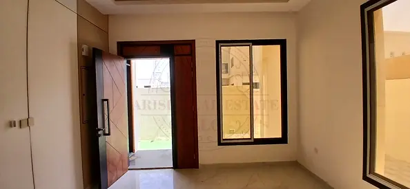 Spacious and elegant villa with 5 master bedrooms, maid room, private balconies, modern washrooms, large living hall, fitted kitchen, central AC, cove