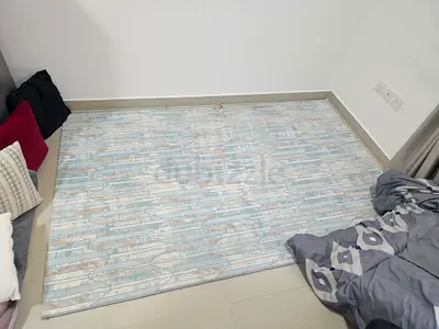 Light Blue Textured Area Rug - Medium Size, Good Condition