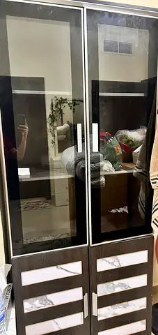 Black cabinet with glass door