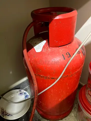 Used LPG Gas Cylinder (Red) with regulator - For Kitchen Use