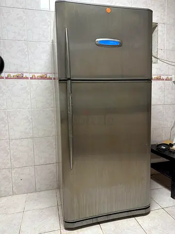 Used double-door refrigerator in good working condition
