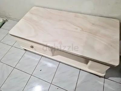 Marble top center table with dining table chair and blue center tablr