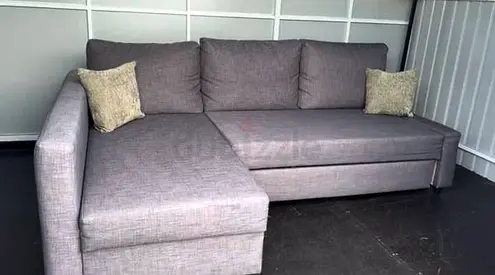 Grey L-shaped Sofa Bed with Storage - Good Condition