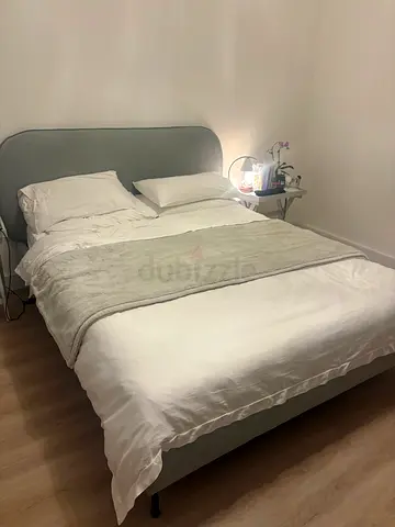 Queen bed frame with upholstered headboard and mattress - light grey