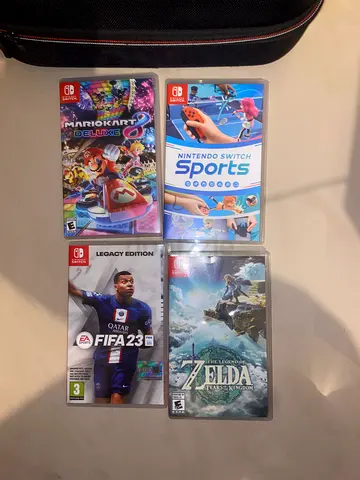 Nintendo Switch games bundle with carrying cases (FIFA 23, Zelda, Mario Kart, Sports…)