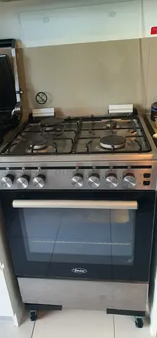 Used Terim brand freestanding gas cooker with oven - stainless steel, good condition