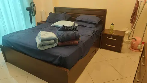 Queen wooden bed frame with mattress and bedside table - good condition