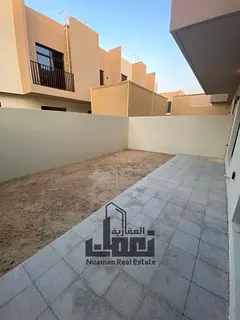 This modern residential townhouse is available for sale in the highly sought-after Nasma Residences
