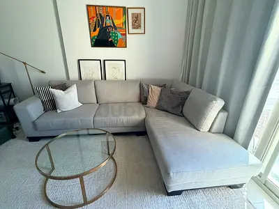 Light grey L-shaped sectional sofa — 3-seater with chaise