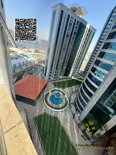 This apartment offers a spacious layout with beautiful open views of the pool and landscaped