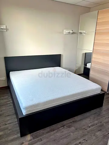 Ikea King Black Malm bed frame with Ikea King mattress