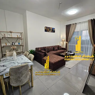 Luxury two-bedroom apartment with a living room and balcony. Ajman, Al Rashidiya 3. Fully furnished. For monthly rent.