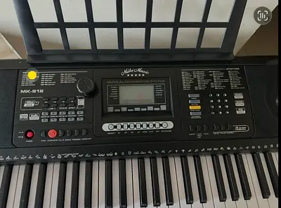 Portable 61-Key Electronic Keyboard with Stand and Music Rest