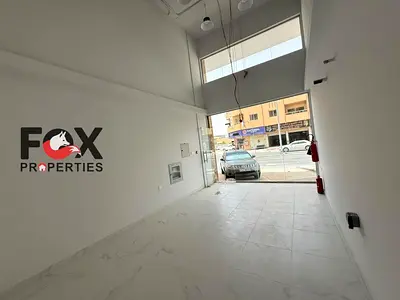 Shop for annual rent in Ajman in the Al Muweihat 3 area on a main street, area of 900 sq. ft, prime location, close to all services