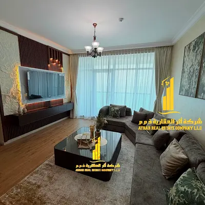 باطلالة بحرية افخم وارقى غرفتين وصاله مفروشة بالكامل للايجار الشهري في كورنيش عجمان ابراج الريزدنس