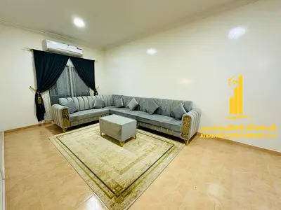 Luxury one-bedroom apartment with a living room and balcony offering an open view. Ajman, Al Muwaihat. Fully furnished