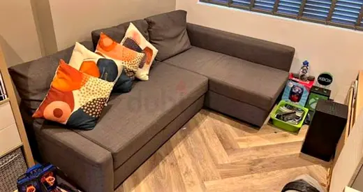Compact L-shaped Grey Fabric Sofa Bed with Storage Ottoman