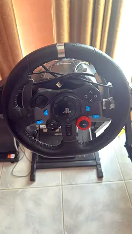 Logitech g29 steering wheel with pedal, gear box, and stand