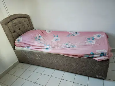Single upholstered bed with storage – good condition