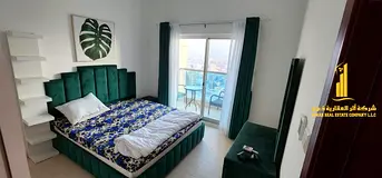 Luxury one-bedroom apartment with a balcony and open views. Ajman City Tower. Fully furnished, avail