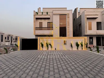 Luxury villa for sale in Al Zahia, Ajman, with a swimming pool and rooftop terrace, including regis