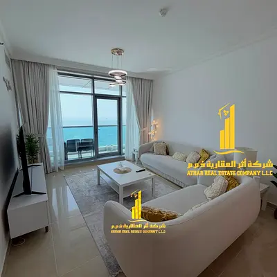 sea view. A luxurious, brand-new, fully furnished two-bedroom apartment with a living room and balcony. Ajman Residence Towers.