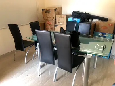 Modern Glass Dining Table with 6 Black Leather Chairs - Excellent Condition