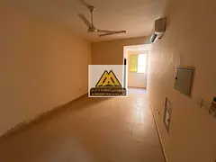 Studio in Al Rawda 3, large space, separate kitchen, split AC, maintenance covered by owner. AED 19,