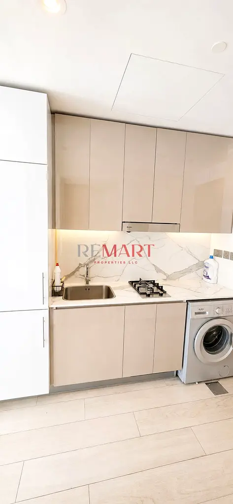 AZIZ RIVIERA 16 l Lavish Studio | Ready to Move | Fitted Kitchen