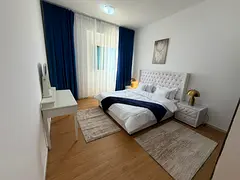 Luxury beachfront apartment, second occupancy, one bedroom, living room with balcony. Ajman Corniche