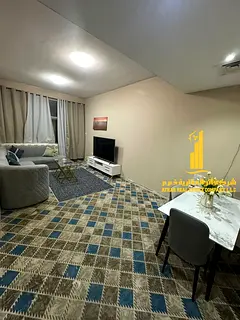 Furnished two-bedroom apartment with a living room for rent in Ajman, Al Rashidiya area. Clean and t