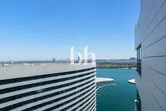 Unfurnished | High Floor | Partial Canal View