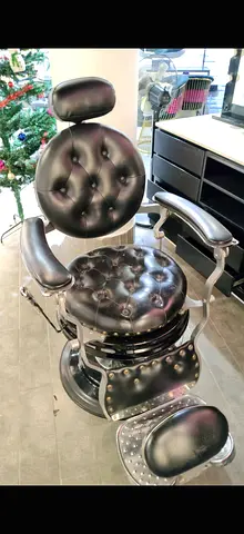 Classic vintage barber chair in good condition