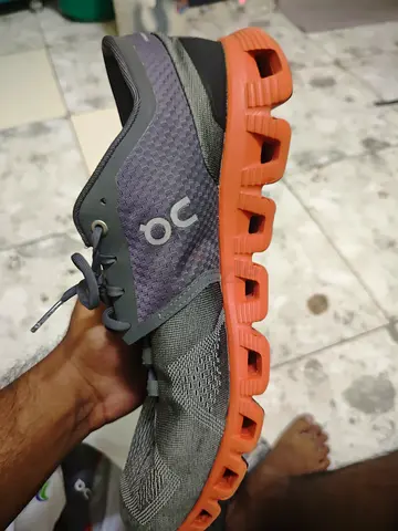 On Cloud running shoes - not used, size unknown (grey with orange sole)