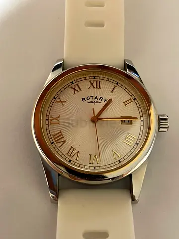 Rotary white dial wristwatch with white silicone strap, good condition