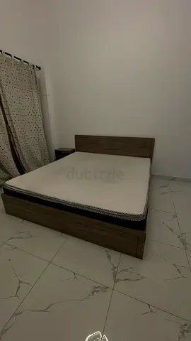 Queen-size wooden bed frame with mattress - good condition