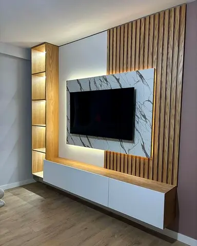 Modern wall-mounted entertainment unit with marble panel and LED lighting